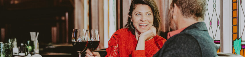 Couple enjoying the classic pub fare menu at Bacchus Lounge in Niagara-on-the-Lake