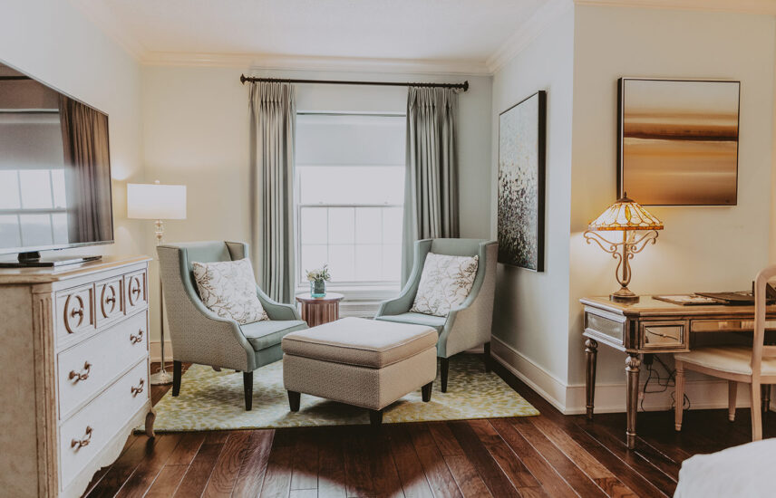 Grand suite with large kind bed at Queen's Landing hotel in Niagara-on-the-Lake