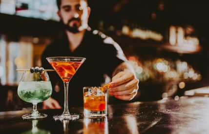 Bartender at Bacchus Lounge preparing cocktails for guests