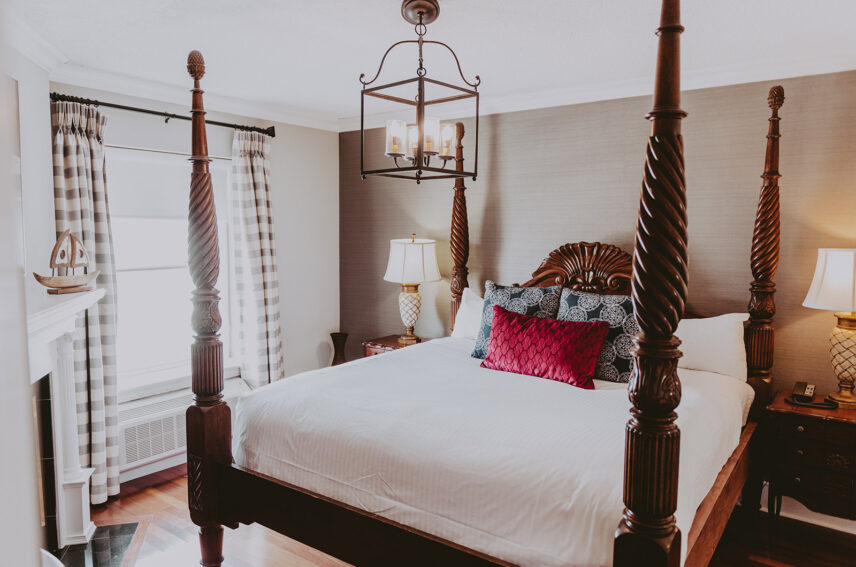 Royal Suite with a four post king at Queen's Landing Hotel, Niagara-on-the-lakesize bed at the Queens Landing Hotel in Niagara-on-the-Lake