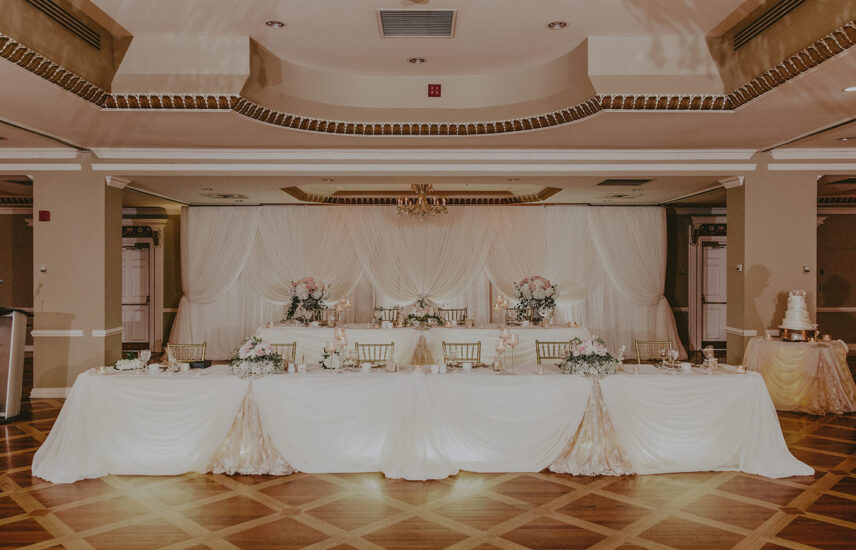 Wedding party seating in the Georgian Ballroom wedding venue at the Queens Landing Hotel in Niagara-on-the-Lake