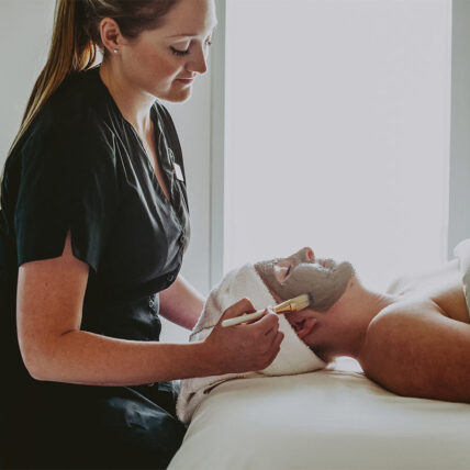A guest receiving a body treatment at our luxurious Ontario spa