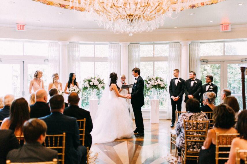 A couple reading their wedding vows at the Queen’s Landing hotel in Niagara-on-the-Lake.