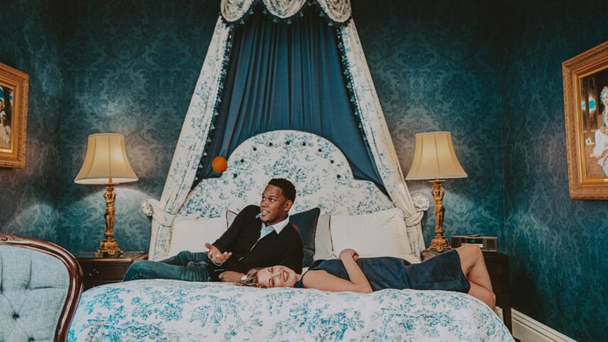 Couple relaxing in their Prince of Wales hotel room in Niagara-on-the-Lake