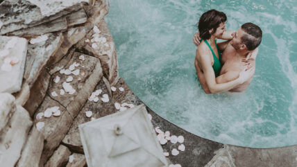 Couple share a romantic moment at 100 Fountain Spa at the Pillar & Post Hotel in Niagara-on-the-Lake