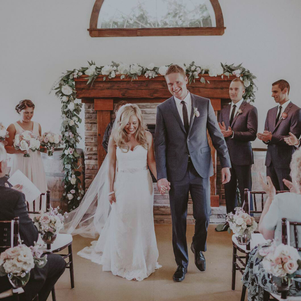 Wedding vows at the Cave Spring Vineyard near Inn On The Twenty in Jordan Station