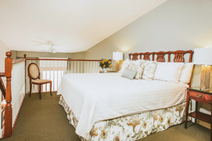 King size bed in Loft Suite at Inn On The Twenty in Jordan Village