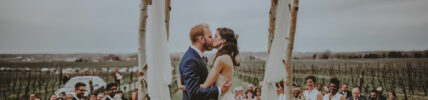 First kiss as husband and wife at Inn On The Twenty wedding venue in Jordan Village