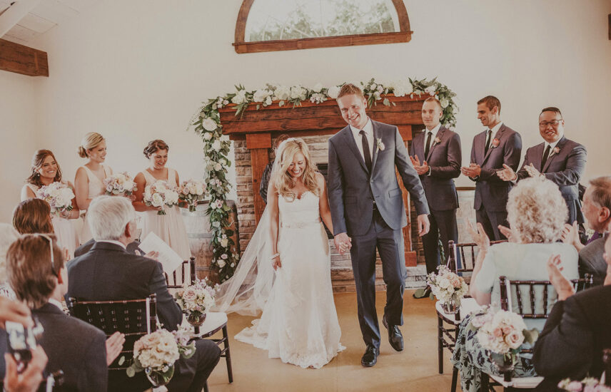 Couple takes first steps as married couple at Cave Spring Vineyard at Inn On The Twenty in Jordan Village