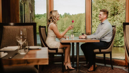 Couple sharing a romantic meal at Headwaters Restaurant at Millcroft Inn & Spa in Caledon