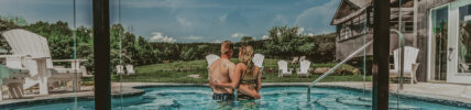 Couple standing in Hot Springs Pool at Millcroft Inn & Spa in Caledon