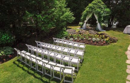 Areil view of wedding ceremony layout of Millcroft’s Riverside Wedding Garden wedding venue at Millcroft Inn & Spa in Caledon