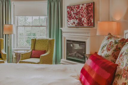 Deluxe guest room with fireplace at the Queens Landing Hotel in Niagara-on-the-Lake