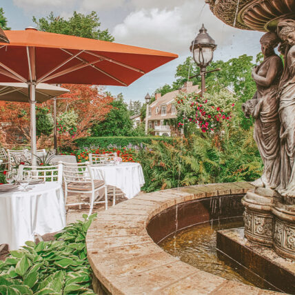 Outdoor garden dining at the Queens Landing Hotel in Niagara-on-the-Lake