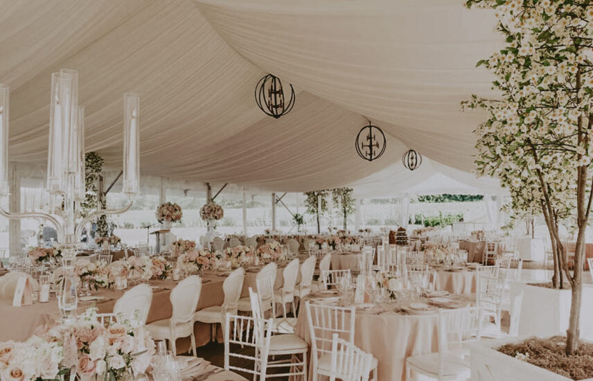 A wedding reception hosted in a tent at Château des Charmes in Niagara-on-the-Lake.