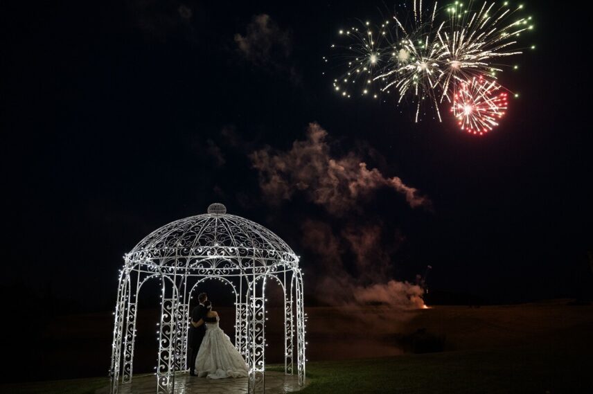Newly married couple watches fireworks at sue ann staff estate winery