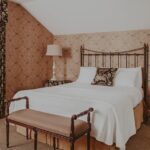 Queen bed in the Mirabella Suite at Moffat Inn in Niagara on the Lake