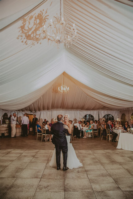 A couple dancing at a tent wedding at Sue-Ann Staff Winery in Niagara-on-the-Lake.