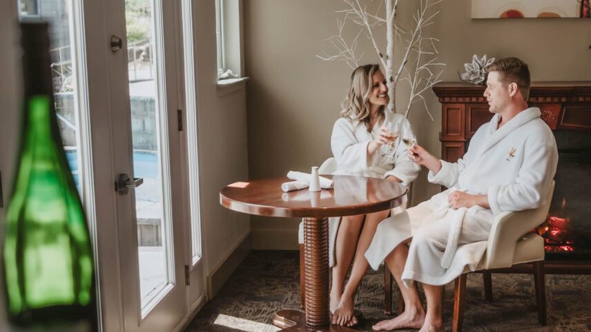 A couple enjoying wine before a spa treatment at Millcroft Spa in Caledon, ON