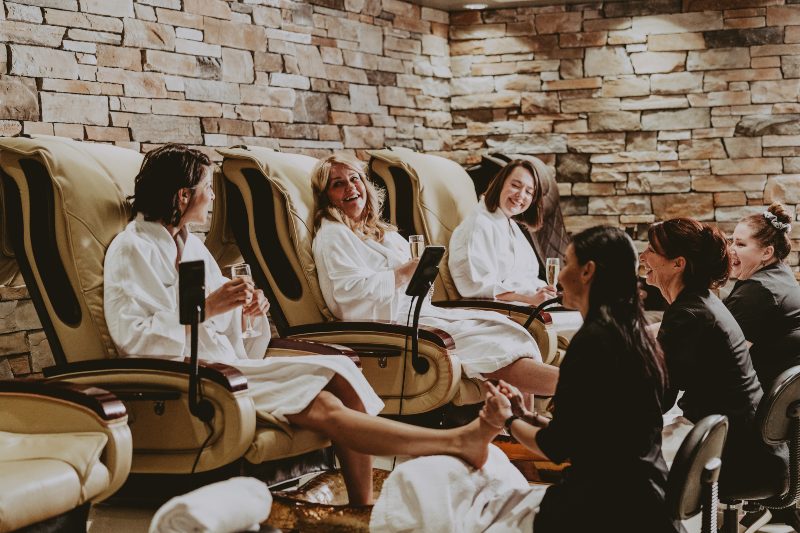 Group of friends enjoying spa treatments on an Ontario getaway at 100 Fountain Spa
