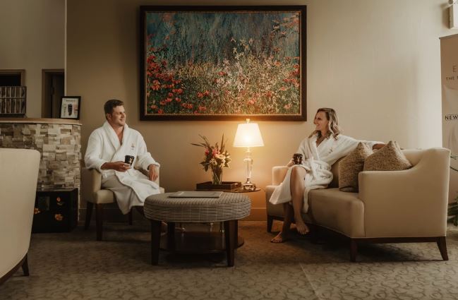 A couple relaxing after enjoying the hot spring pools at Millcroft Spa in Ontario