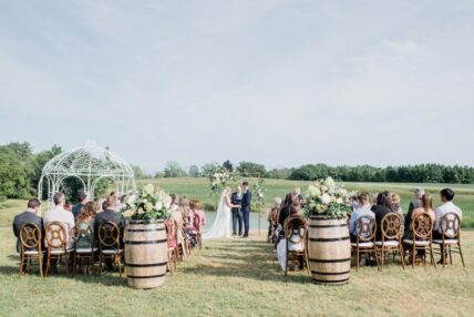 A couple is married in a pond-side ceremony at Sue-Ann Staff Estate Winery