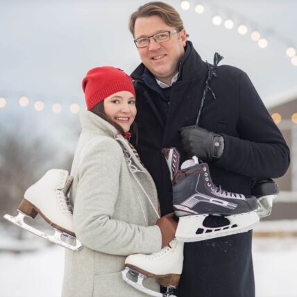 A couple gets ready to skate on the ice rink at Pillar and Post in Niagara-on-the-Lake
