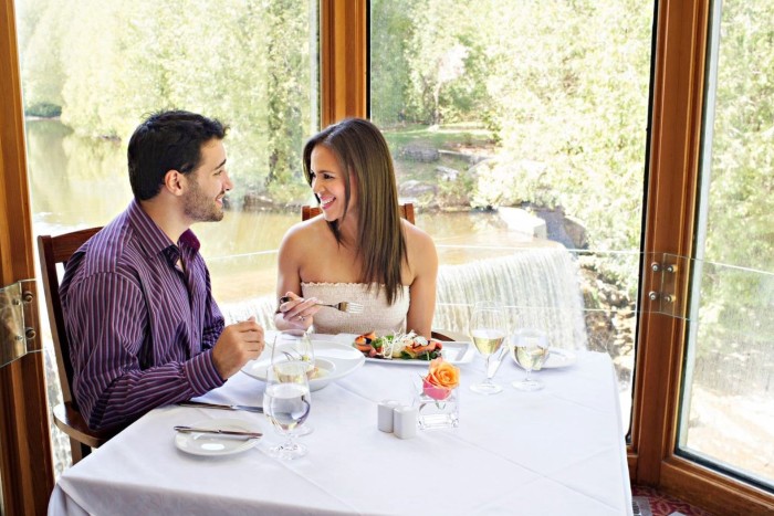 A couple enjoying a fall meal at Headwaters Restaurant in Caledon