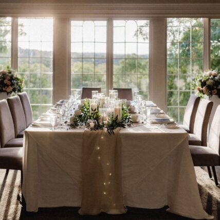 A headtable wedding set up in the Windows Room at Inn On The Twenty