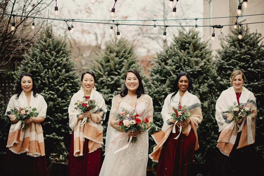 A bridal party wearing earthy colours for a wedding