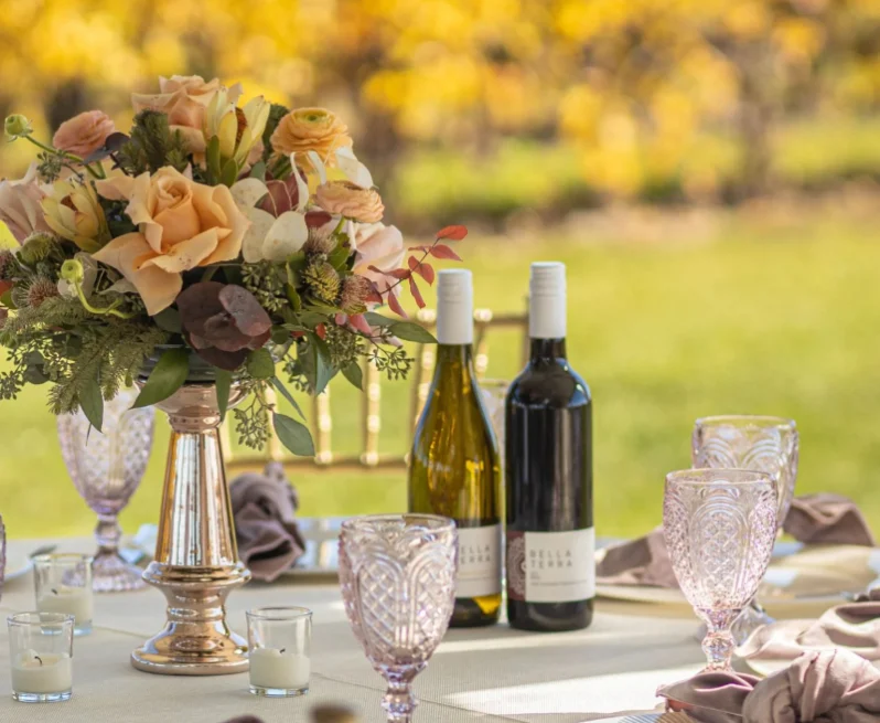 Place settings and wine at a wedding at Bella Terra Vineyards