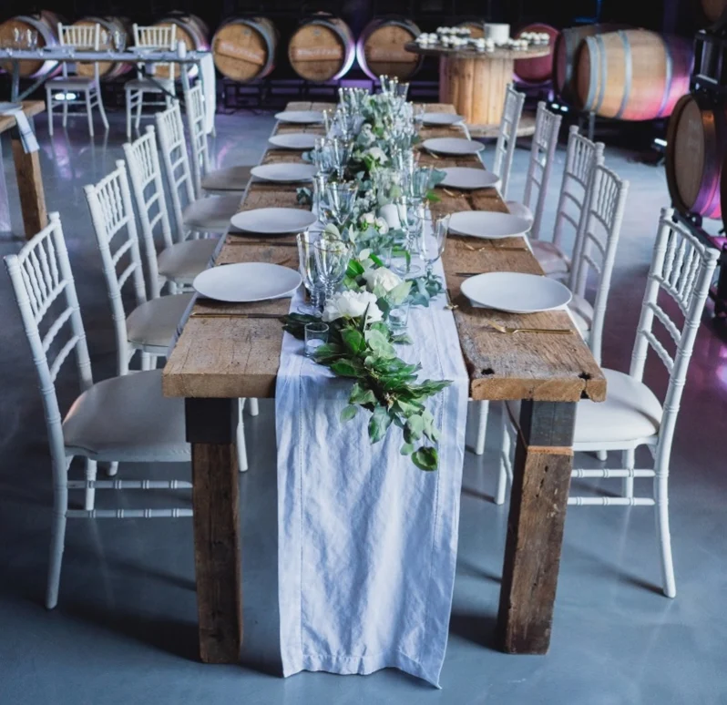 A table set for a rehearsal dinner at The Hare Wine Co. in Niagara on the Lake