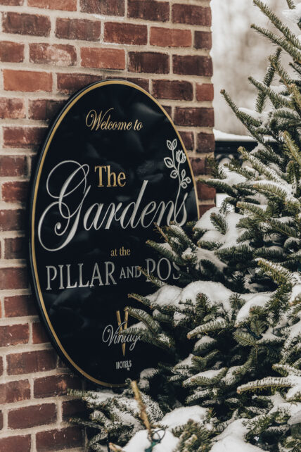 Outdoor sign for the Gardens at Pillar and Post