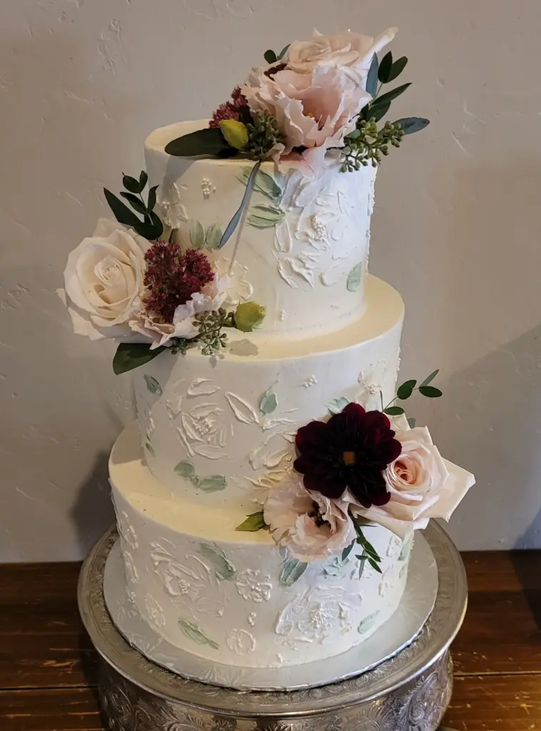 A textured wedding cake, a 2023 wedding cake trend