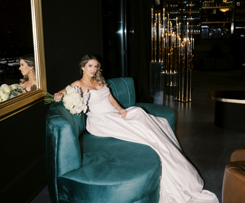 Bride posing for photo at AMO Estate Winery in Niagara-on-the-Lake