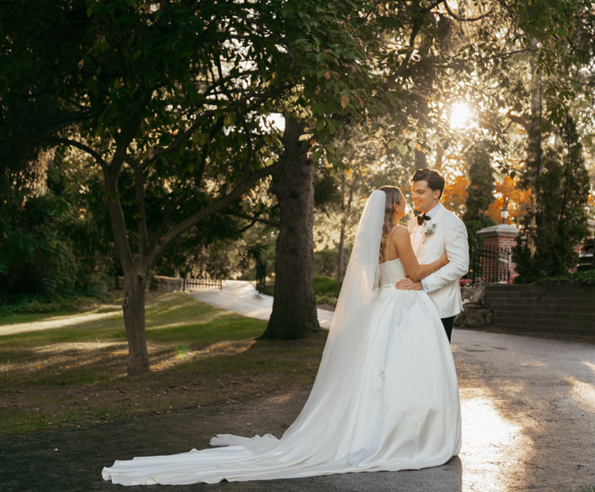 Wedding couple near Water View Garden at Queen's Landing hotel in Niagara-on-the-Lake