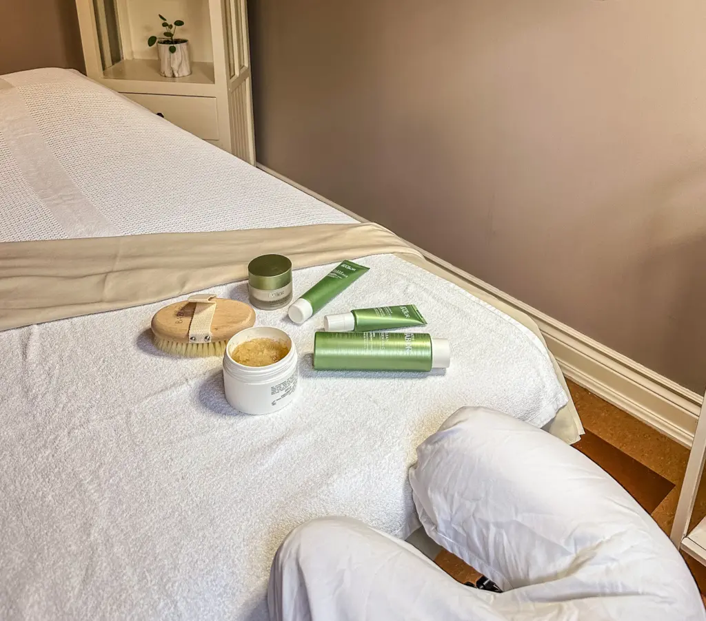 BABOR body products on a massage bed.