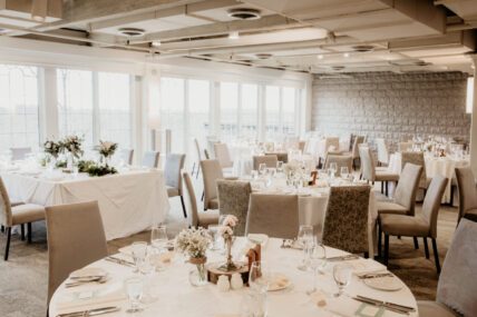 An indoor wedding reception and ceremony space in the winter