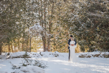 A bride and groom after their Christmas wedding at Millcroft Inn & Spa