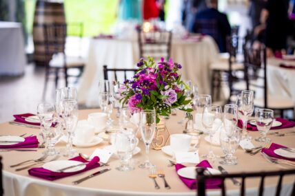 Brightly coloured flowers and table setting at Sue-Ann Staff Estate Winery.