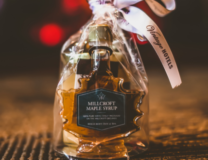 A bottle of Millcroft Maple Syrup.