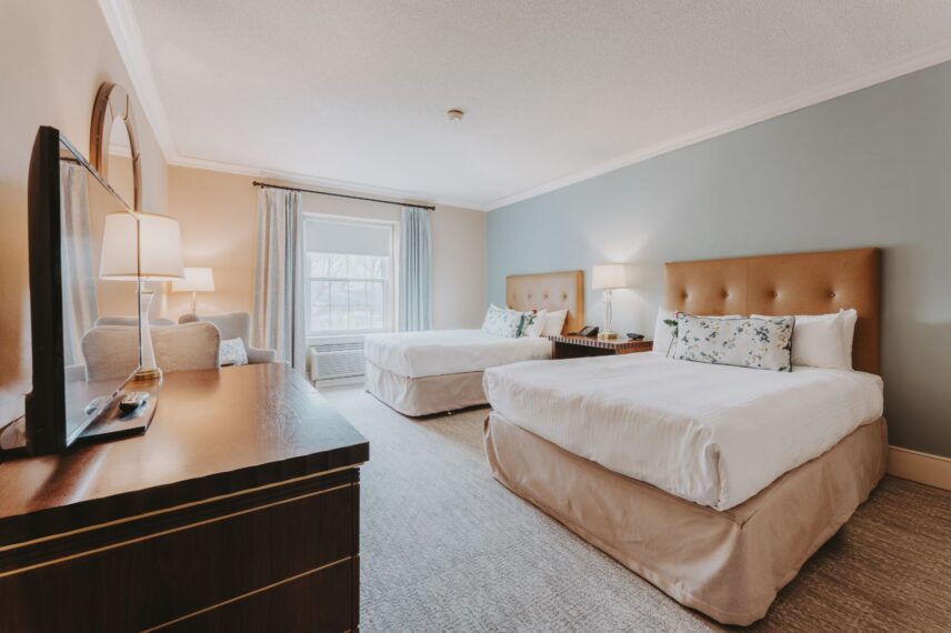 Two beds in a Traditional Guest Room Bed at the Queen's Landing hotel in Niagara-on-the-Lake.