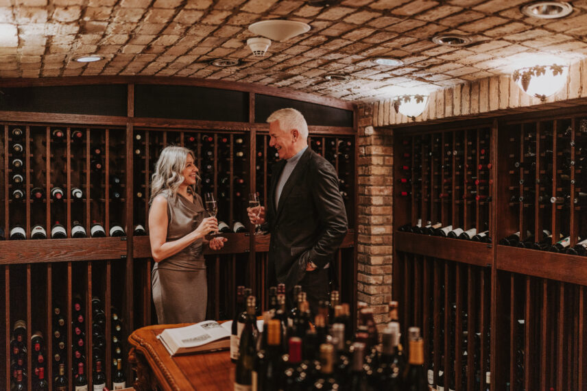A couple taking part in a wine tasting in Niagara-on-the-Lake.