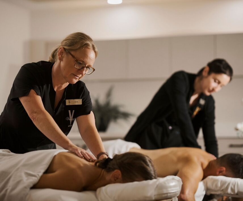 A couple receiving a massage at 100 Fountain Spa in Niagara-on-the-Lake.