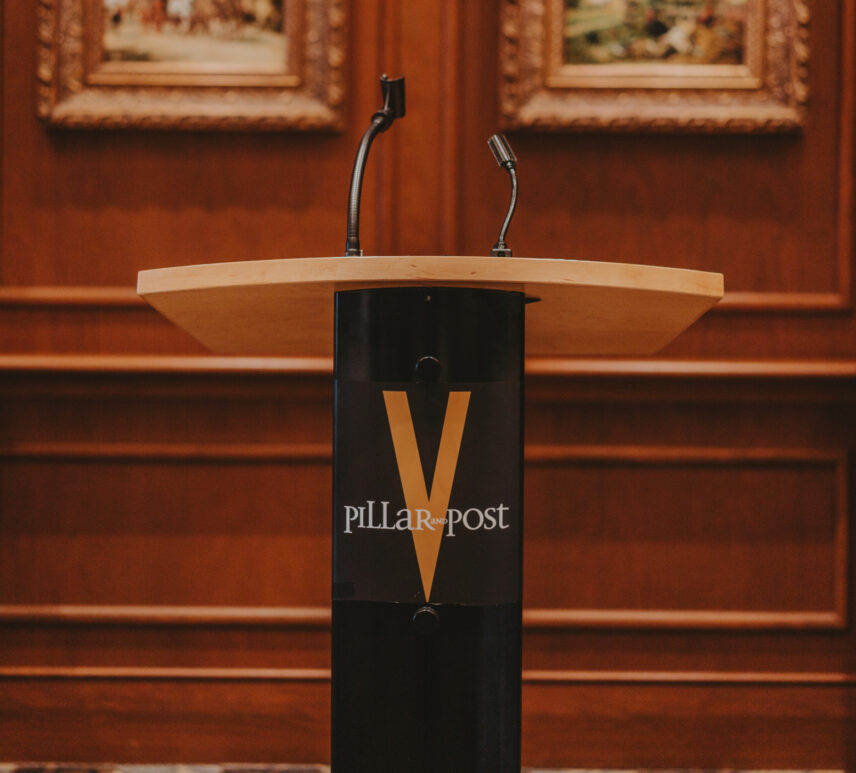 Olde Library podium and logistics coordination for conferences with Vintage Hotels.