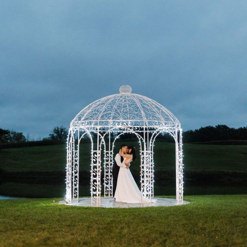 A newly married couple dances in the moonlight at Sue Ann Staff Estate Winery