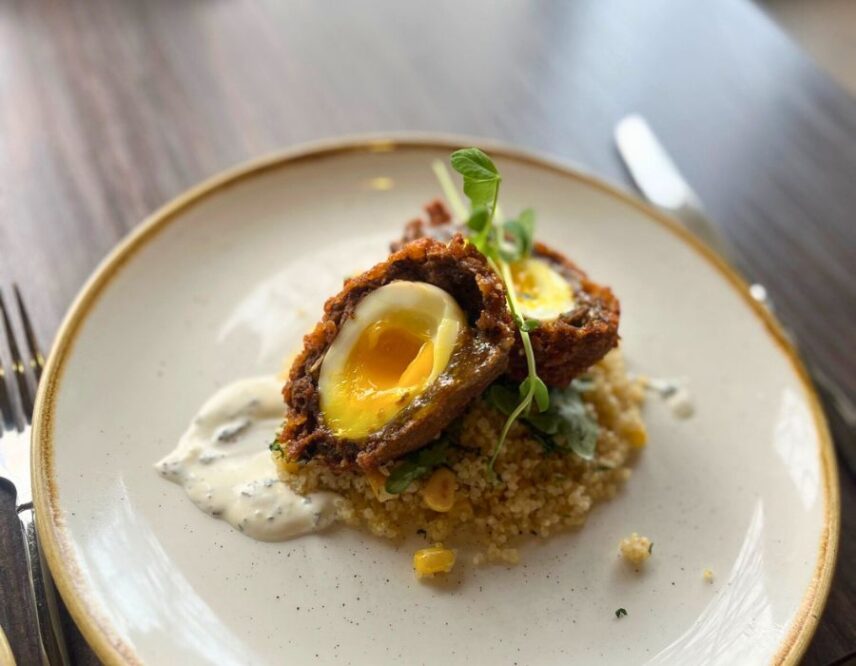 Scotch Egg paired with a colourful quinoa succotash.