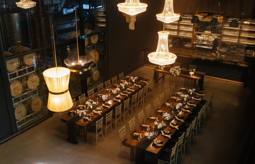 AMO Estate Winery wedding reception set-up with harvest tables in Niagara on the Lake