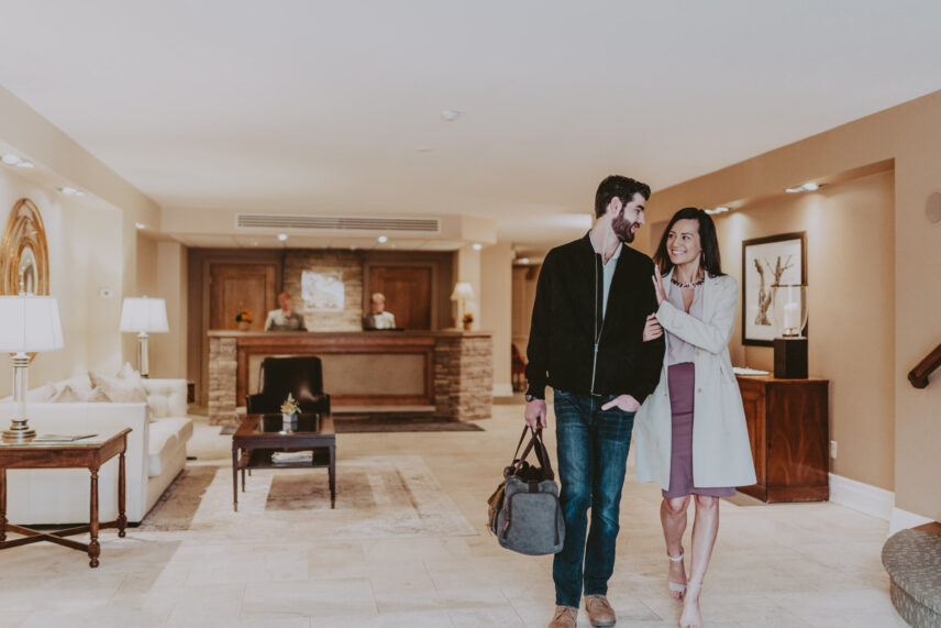 Couple in lobby at Inn On The Twenty hotel in Jordan Village, Ontario