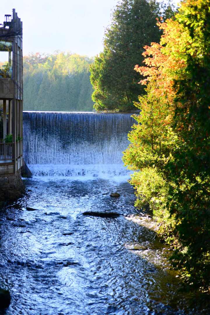 Millcroft waterfall and millpond in Caledon Ontario during autumn at Millcroft Inn & Spa
